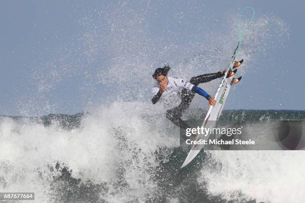 Guillermo Satt of Chile falls from his board whilst competing in the Men's Repechage Round 1 during day five of the ISA World Surfing Games 2017 at...