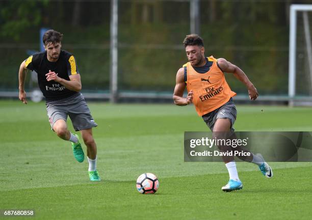 Alex Oxlade-Chamberlain and Carl Jenkinson of Arsenal during the Arsenal Training Session at London Colney on May 24, 2017 in St Albans, England.