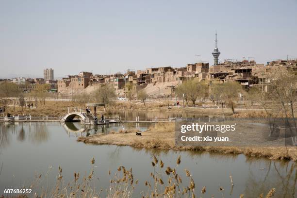 tuman river flows through downtown kashgar,china - kashgar stock-fotos und bilder