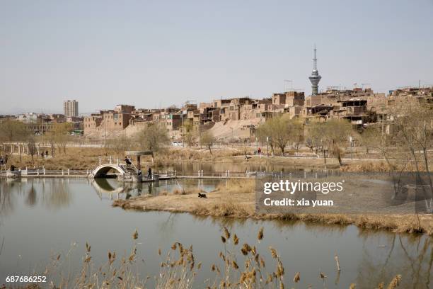 tuman river flows through downtown kashgar,china - kashgar stockfoto's en -beelden