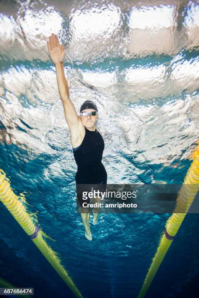 women in sport, swimming - indoor triathlon stock pictures, royalty-free photos & images