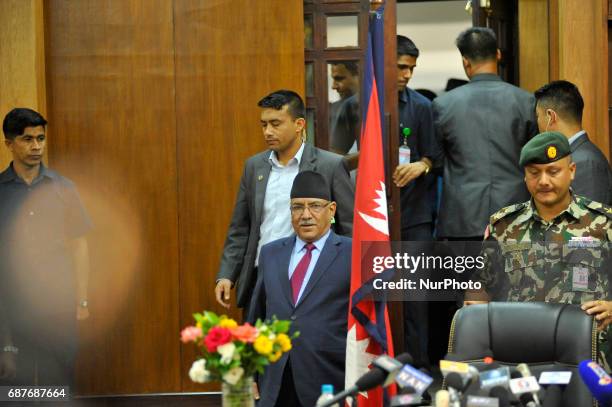 Prime Minister of Nepal, Pushpa Kamal Dahal, arrives to resigns after addressing the nation from his office at Singh Durbar, Kathmandu, Nepal on...