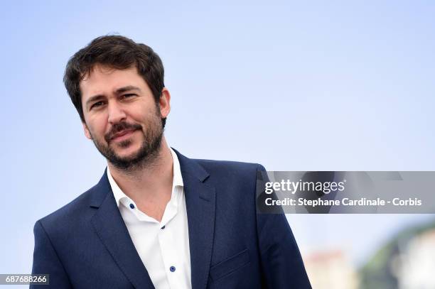 Director Santiago Mitre attends the "La Cordillera - El Presidente" photocall during the 70th annual Cannes Film Festival at Palais des Festivals on...