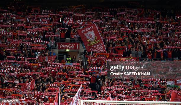 Liverpool fans sing prior to an end-of-season friendly football match against Sydney FC at the Olympic Stadium in Sydney on May 24, 2017. / IMAGE...