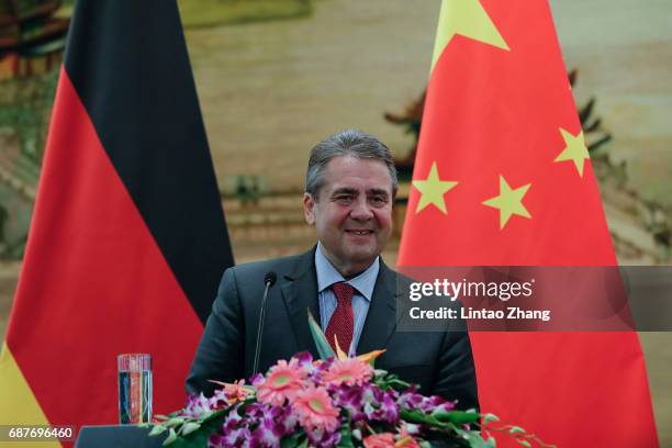 German Foreign Minister Sigmar Gabriel speaks during a joint press conference with China's Foreign Minister Wang Yi at the foreign ministry on May...