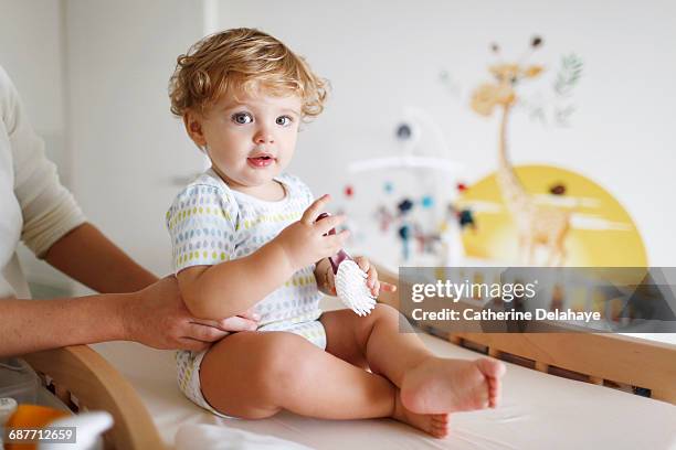 Baby Being Changed Photos and Premium High Res Pictures - Getty Images