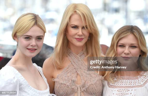 Elle Fanning, Nicole Kidman and Kirsten Dunst attend the "The Beguiled" Photocall during the 70th annual Cannes Film Festival at Palais des Festivals...