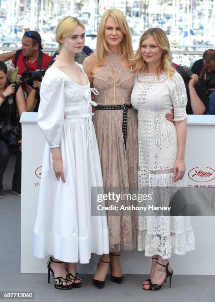 Elle Fanning, Nicole Kidman and Kirsten Dunst attend the "The Beguiled" Photocall during the 70th annual Cannes Film Festival at Palais des Festivals...