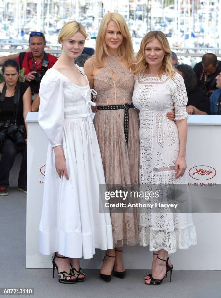 Elle Fanning, Nicole Kidman and Kirsten Dunst attend the "The Beguiled" Photocall during the 70th annual Cannes Film Festival at Palais des Festivals...