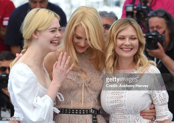 Elle Fanning, Nicole Kidman and Kirsten Dunst attend the "The Beguiled" Photocall during the 70th annual Cannes Film Festival at Palais des Festivals...