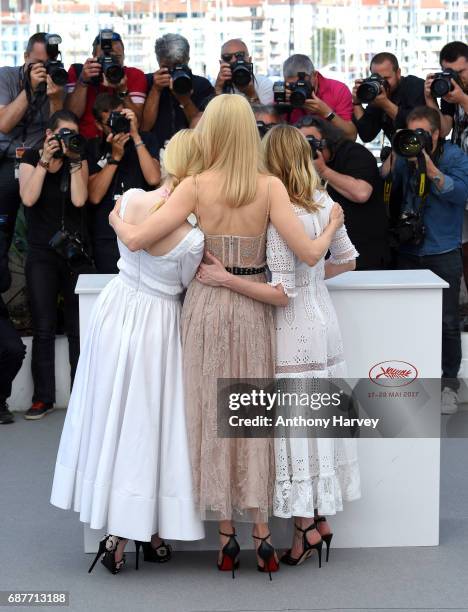 Elle Fanning, Nicole Kidman and Kirsten Dunst attend the "The Beguiled" Photocall during the 70th annual Cannes Film Festival at Palais des Festivals...