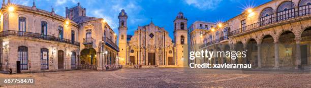 panoramic view of illuminated havana cathedral - havana stock pictures, royalty-free photos & images