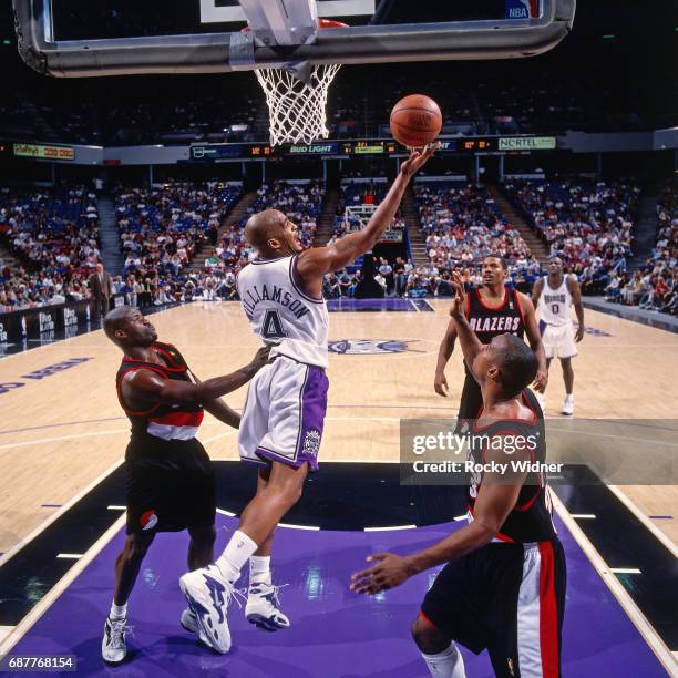 Corliss Williamson of the Sacramento Kings shoots against the Portland Trail Blazers circa 1996 at Arco Arena in Sacramento, California. NOTE TO...