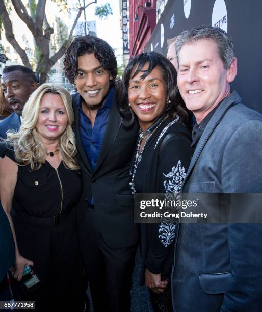 Actor Navi poses for a photograph as he arrives at the Lifetime Hosts Fan Gala And Advance Screening For "Michael Jackson: Searching For Neverland"...
