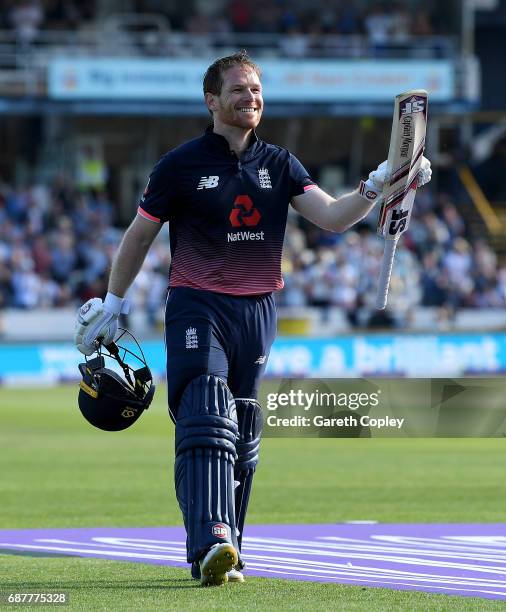 England captain Eoin Morgan salutes the crowd as he leaves the field after making 107 runs during the 1st Royal London ODI match between England and...