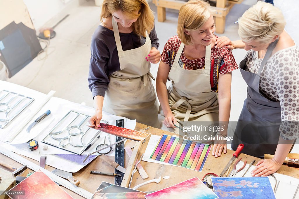 Stained glass artists working in studio