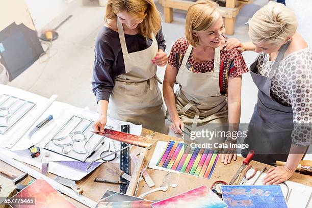 Stained Glass Artists Working In Studio High-Res Stock Photo