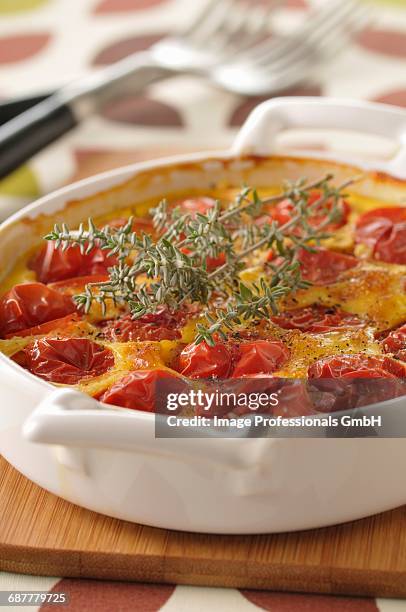 cherry tomato,thyme and goats cheese flan - flan stock pictures, royalty-free photos & images