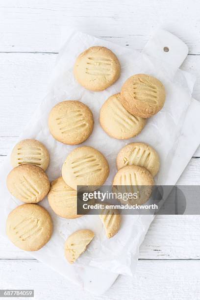 melting moments biscuits on a chopping board - shortbread stock pictures, royalty-free photos & images