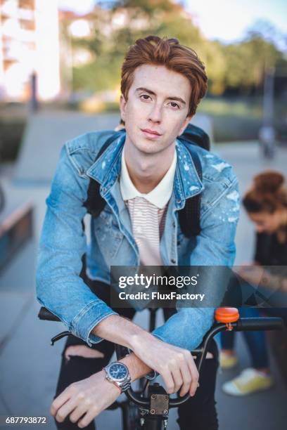 portrait of mail on a bmx - mens hair model stock pictures, royalty-free photos & images