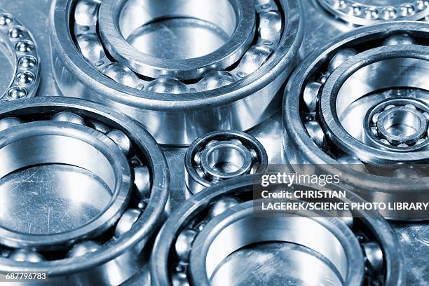 gears and ball bearings - ball bearing stock pictures, royalty-free photos & images