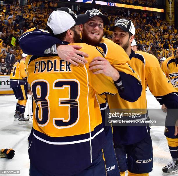 Colton Sissons of the Nashville Predators hugs teammate Vernon Fiddler after scoring a hat trick in a 6-3 victory over the Anaheim Ducks in Game Six...
