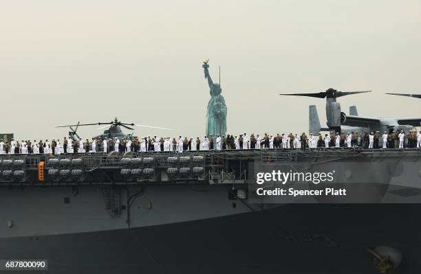 The USS Kearsarge joins The Parade of Ships as it makes its way past the Statue of Liberty on the opening day of Fleet Week on May 24, 2017 in New...