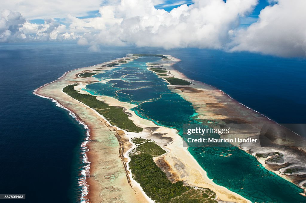 Aerial view of the fringing reef and the inside lagoon of Millennium Atoll.