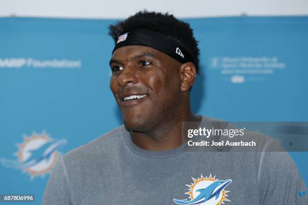 Julius Thomas of the Miami Dolphins talks to the media after the teams OTA's on May 24, 2017 at the Miami Dolphins training facility in Davie,...