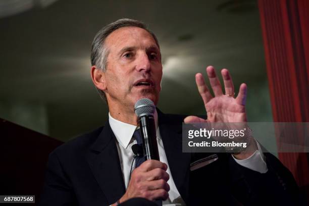 Howard Schultz, chairman and founder of Starbucks Corp., speaks during a conference at the Economic Club of New York in New York, U.S., on Wednesday,...
