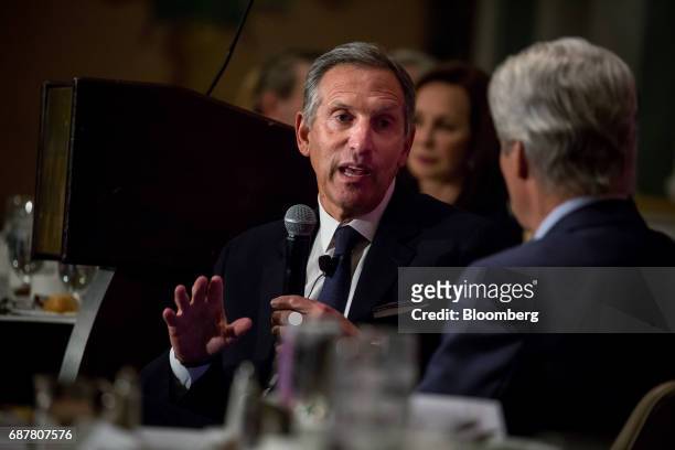 Howard Schultz, chairman and founder of Starbucks Corp., speaks during a conference at the Economic Club of New York in New York, U.S., on Wednesday,...