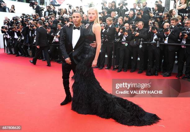 French fashion designer Olivier Rousteing and Dutch model Lara Stone pose as they arrive on May 24, 2017 for the screening of the film 'The Beguiled'...