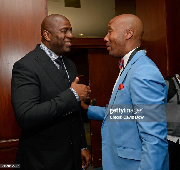 Magic Johnson of the Los Angeles Lakers talks with Former NBA player, Bruce Bowen during the 2017 NBA Draft Lottery at the New York Hilton in New...