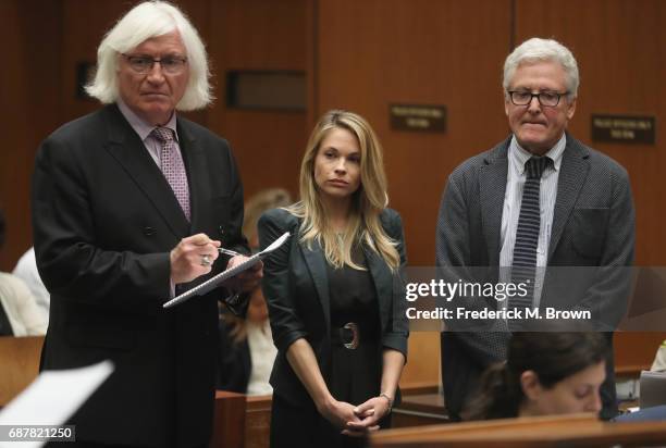 Attorney Thomas Mesereau, model Dani Mathers and attorney Dana M. Cole stand during court proceedings for a hearing at Clara Shortridge Foltz...