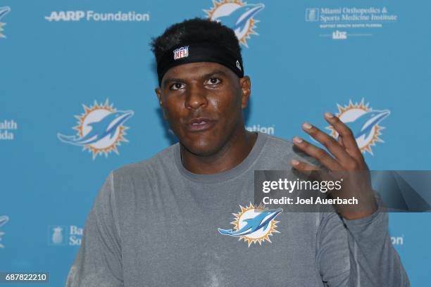 Julius Thomas of the Miami Dolphins talks to the media after the teams OTA's on May 24, 2017 at the Miami Dolphins training facility in Davie,...