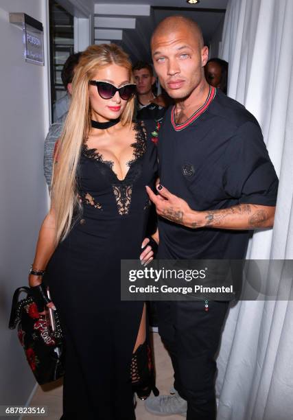 Paris Hilton and Jeremy Meeks attends the/walks the runway at the Philipp Plein Cruise Show 2018 during the 70th annual Cannes Film Festival at on...