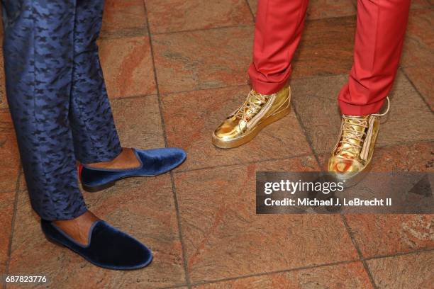 The shoes of Andrew Wiggins of the Minnesota Timberwolves and Joel Embiid of the Philadelphia 76ers during the 2017 NBA Draft Lottery at the New York...