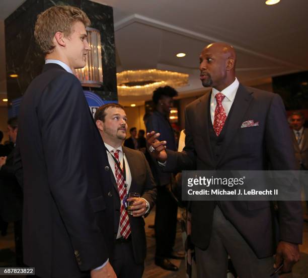 Alonzo Mourning of the Miami Heat talks with NBA Draft prospect, Lauri Markkanen during the 2017 NBA Draft Lottery at the New York Hilton in New...