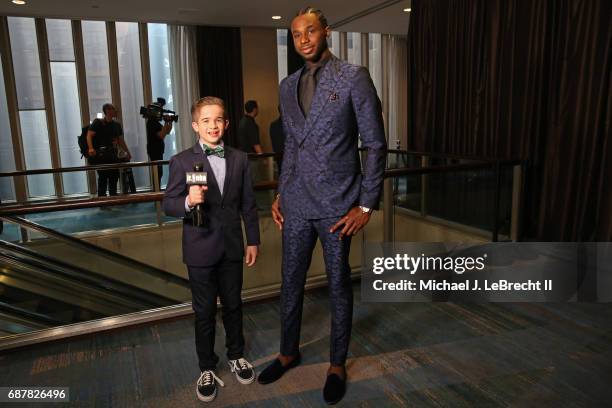 Sports Illustrated Kids Reporter, Max Bonnstetter interviews Andrew Wiggins of the Minnesota Timberwolves during the 2017 NBA Draft Lottery at the...