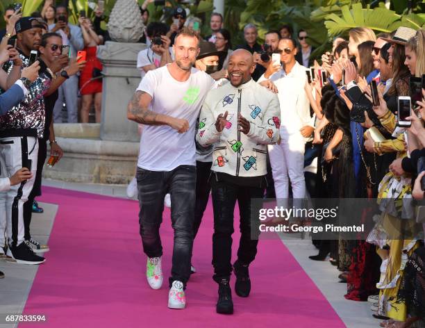 Designer Philipp Plein and Boxer Floyd Mayweather Jr. Attend the runway at the Philipp Plein Cruise Show 2018 during the 70th annual Cannes Film...