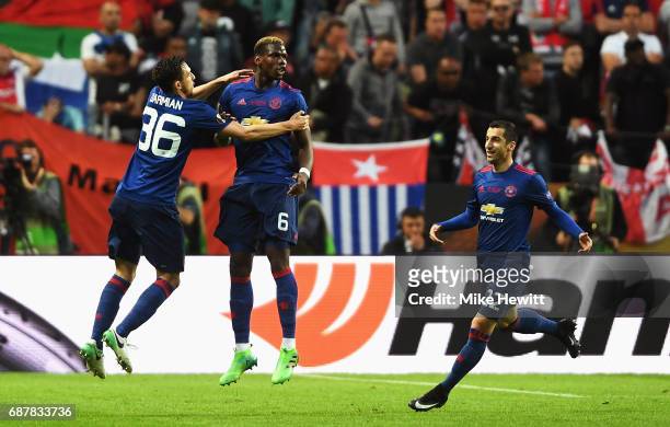 Paul Pogba of Manchester United celebrates scoring his sides first goal with Henrikh Mkhitaryan of Manchester United and Matteo Darmian of Manchester...
