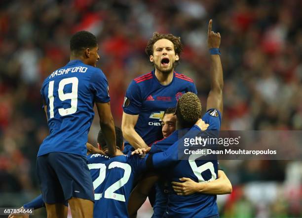 Paul Pogba of Manchester United celebrates scoring his sides first goal with his Manchester United team mates during the UEFA Europa League Final...