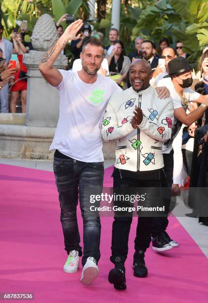 Designer Philipp Plein and Boxer Floyd Mayweather Jr. Attend the runway at the Philipp Plein Cruise Show 2018 during the 70th annual Cannes Film...