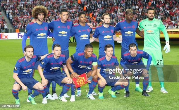 The Manchester United team lines up ahead of the UEFA Europa League Final match between Manchester United and Ajax at Friends Arena on May 24, 2017...