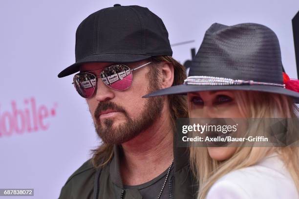 Singer Billy Ray Cyrus and Tish Cyrus arrive at the 2017 Billboard Music Awards at T-Mobile Arena on May 21, 2017 in Las Vegas, Nevada.