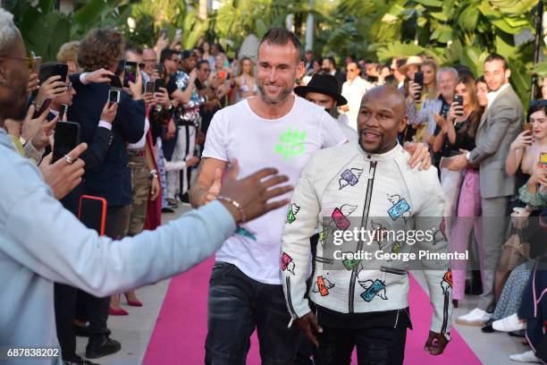 Designer Philipp Plein and Boxer Floyd Mayweather Jr. Attend the runway at the Philipp Plein Cruise Show 2018 during the 70th annual Cannes Film...