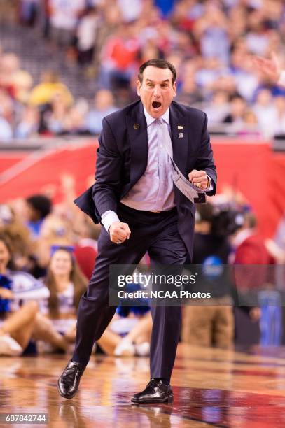 Coach Mike Krzyzewski of Duke University yells to his players against University of Wisconsin during the championship game at the 2015 NCAA Photos...