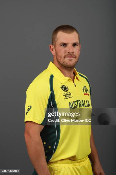 Aaron Finch of Australia poses during a portrait session ahead of the ICC Champions Trophy at the Royal Garden Hotel on May 24, 2017 in London,...