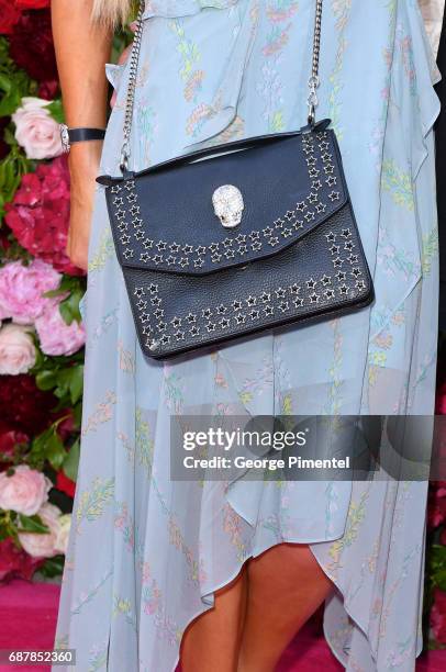 Detail of Paris Hilton purse at the Philipp Plein Cruise Show 2018 during the 70th annual Cannes Film Festival at on May 24, 2017 in Cannes, France.