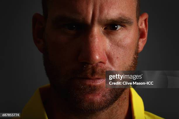 John Hastings of Australia poses during a portrait session ahead of the ICC Champions Trophy at the Royal Garden Hotel on May 24, 2017 in London,...